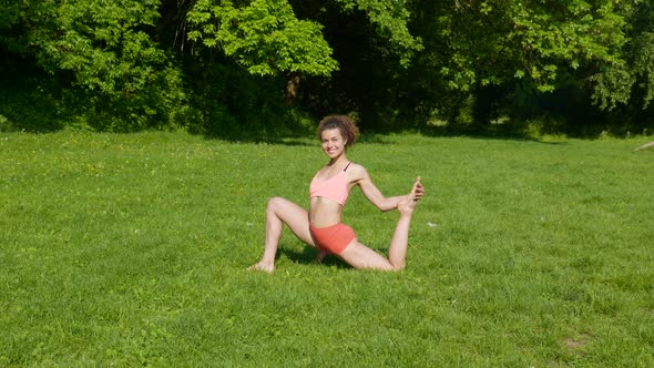 Young Woman Doing Sports at Nature