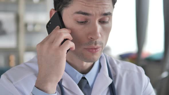 Doctor Talking on Phone