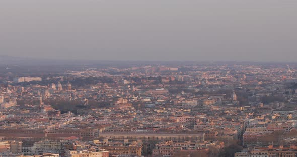 Pan of Rome and San Pietro at Sunset