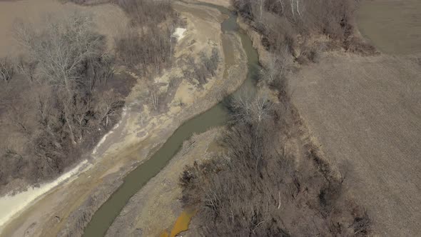 River flow and coastal area polluted from metal mining 4K aerail video