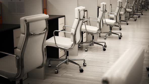 Aerial view of the corporate open room with white, empty office cubicles.