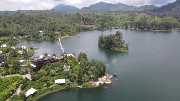 Aerial view of lake side with park and mountain in Bandung, Indonesia