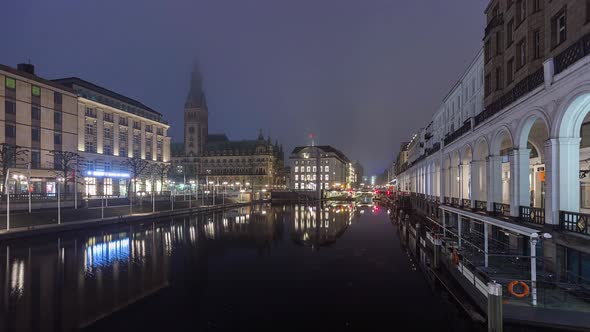 Night to Day Time Lapse of town hall with fog, Hamburg, Germany