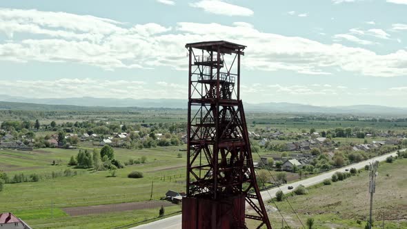 Aerial Wiev: Old Abandoned Salt Mine Against the Background Forest. Midle Shot