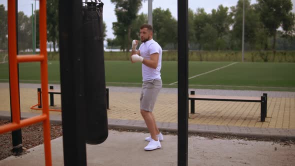 Man Is Having Intensive Street Work Out