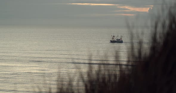 Fishing boat in the North Sea on the coastline of Sylt