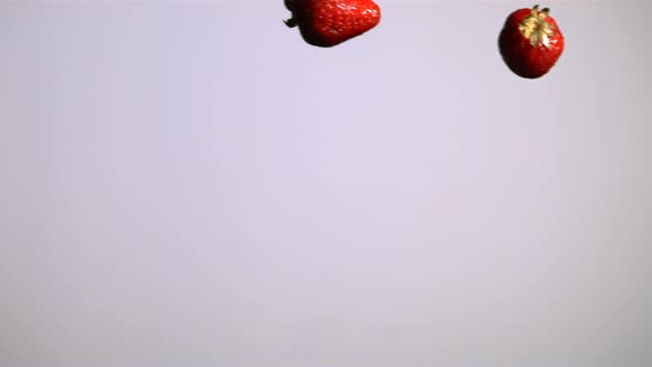 Water splash with fruit in ultra slow motion 1500fps - reflective surface - WATER SPLASH w FRUIT 011