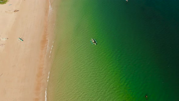 Ocean with Waves and Yellow Beach