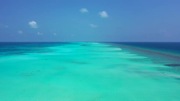 Aerial drone panorama of marine coast beach journey by aqua blue lagoon and white sand background of