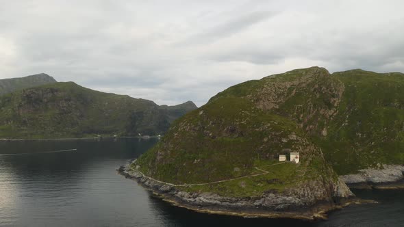 Panorama Of Hendanes Lighthouse With Island Views And Seascape In Maloy, Norway. - aerial