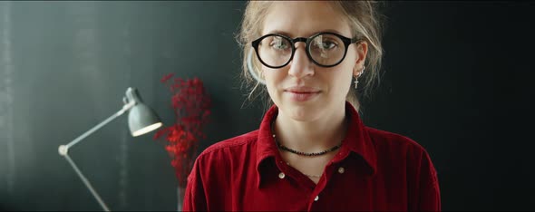 Portrait of Young Businesswoman in Glasses