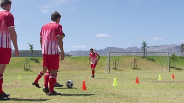 Soccer players training on field