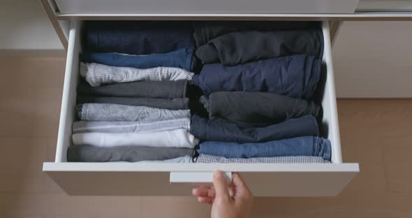 Open the Drawer with Clothes