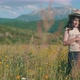 Little Girl In Flowers Field - VideoHive Item for Sale