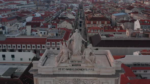 Close Up Aerial View of Monument with Inscription on the Top of Arco Da Rua Augusta in Praca Do