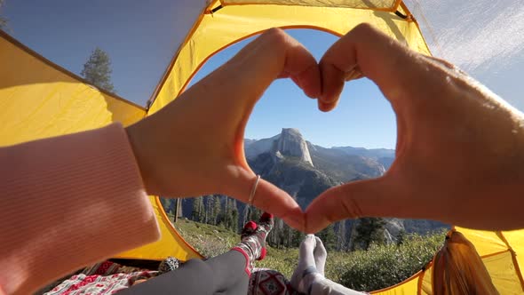 A Hand Heart Against the Background of the Picturesque View of Half Dome Cliff. Yosemite Valley, USA