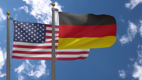 Usa Flag Vs Germany Flag On Flagpole