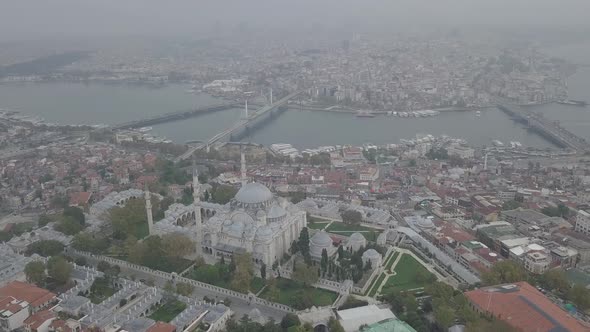 Aerial footage of Suleymaniye Mosque from a foggy day