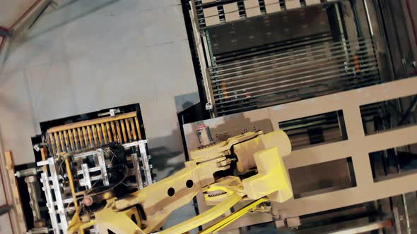 Automated Factory Conveyor Line Puts Bricks on a Line at a Factory