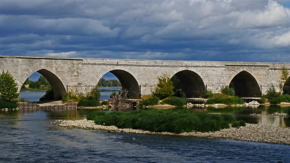 Beaugency, Loiret, France. Stone arched bridge over the river Loire