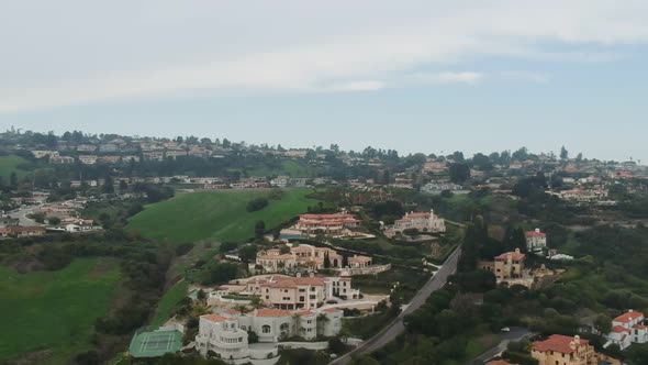 Midday drone view and landing slowly above the Pales Verdes Estates golf club, California. ( DJi Spa