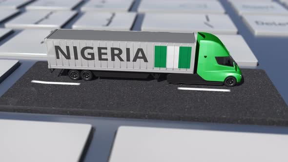 Flag of Nigeria on Moving Truck and Computer Key