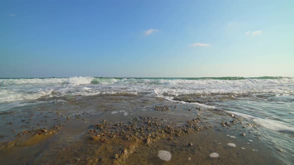 Shallow Rocky Reef Between the Sea and the Beach