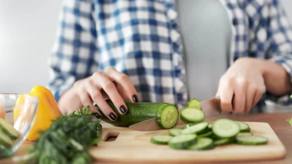 Closeup Female Hands Chopping Fresh Organic Cucumber Using Knife Cooking Healthy Food Salad