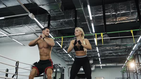 Sport Couple Training in the Gym