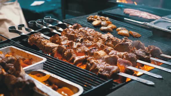 Shish Kebab Cooked on the Grill on the Street Market