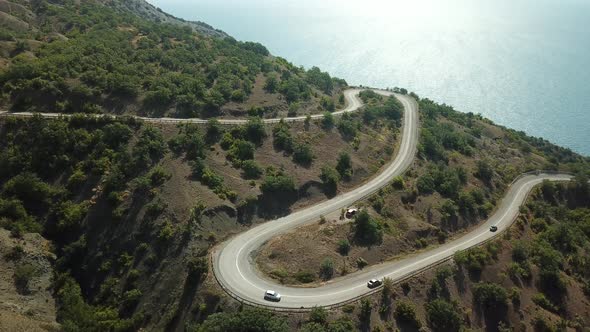 A Winding Road Through the Crimean Mountains Along the Sea