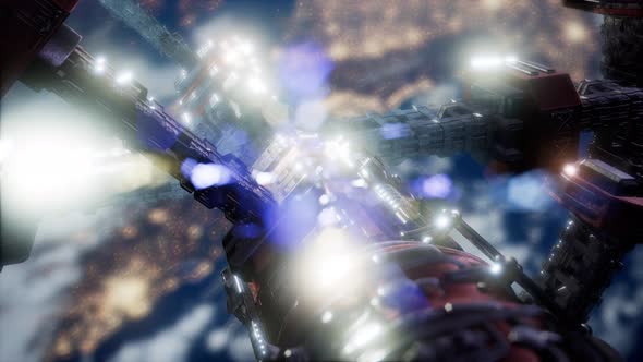 International Space Station in Outer Space Over the Planet Earth alt