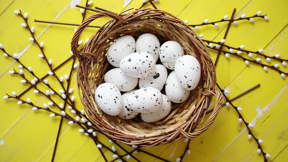 Whole Chicken Eggs in Brown Wicker Basket. The Concept of Easter Holidays