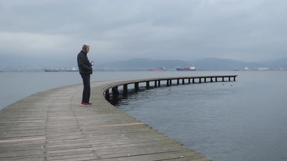 Strolling At Wooden Dock