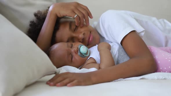 Cute African Siblings Sleep Together