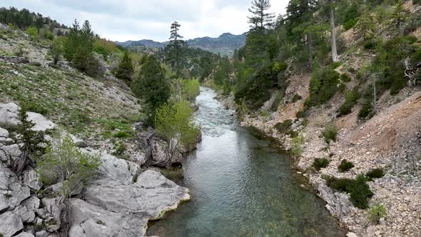 Mountain river high in the mountains aerial view 4 K