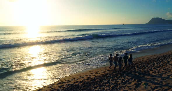 Tourists walking at beach 4k