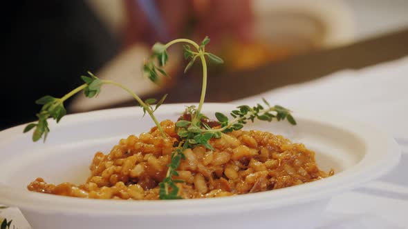 Traditional Italian Risotto on Street Food Market Festival in Barcelona