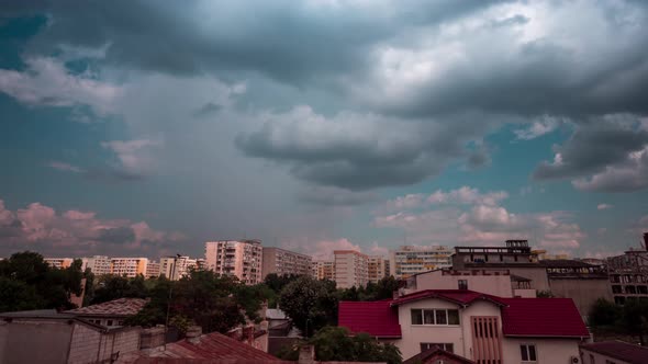 Storm Rainy Dramatic Clouds Moving Fast Over a Residential Area in City