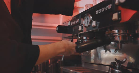 Barista preparing to make coffe