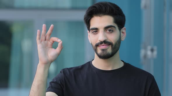 Headshot Happy Young Middle Eastern Man Showing Okay Gesture Satisfied Service