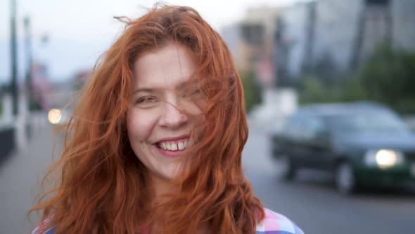 Portrait of Beautiful Redhead Woman Smiling Cheerful Enjoying Successful Urban Lifestyle in City 