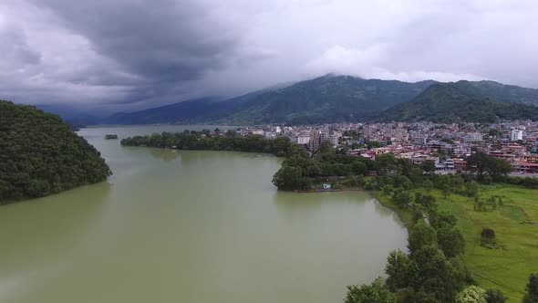 Aerial view of city on next to a river in Philippines.