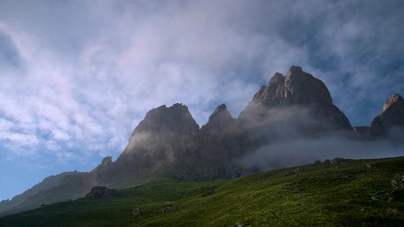 Timelapse An Incredibly Beautiful Scene the Top of a Rocky Mountain is Covered with Massive Clouds