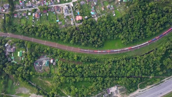 Drone View of a Moving Freight Train in the Suburbs of Vladivostok