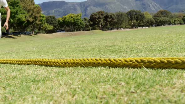 Fielder saving a boundary during cricket match