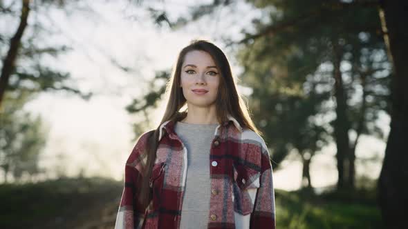 Portrait of a Beautiful Young Woman in a Casual Shirt