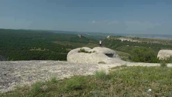 Female Tourist in the Mountains