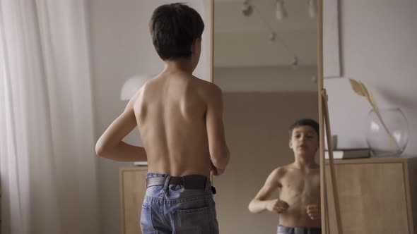 Cute Caucasian Boy Showing Muscles Front Mirror Sport Power Health Care