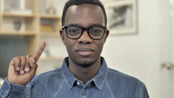 No By AfroAmerican Man Waving Finger to Reject